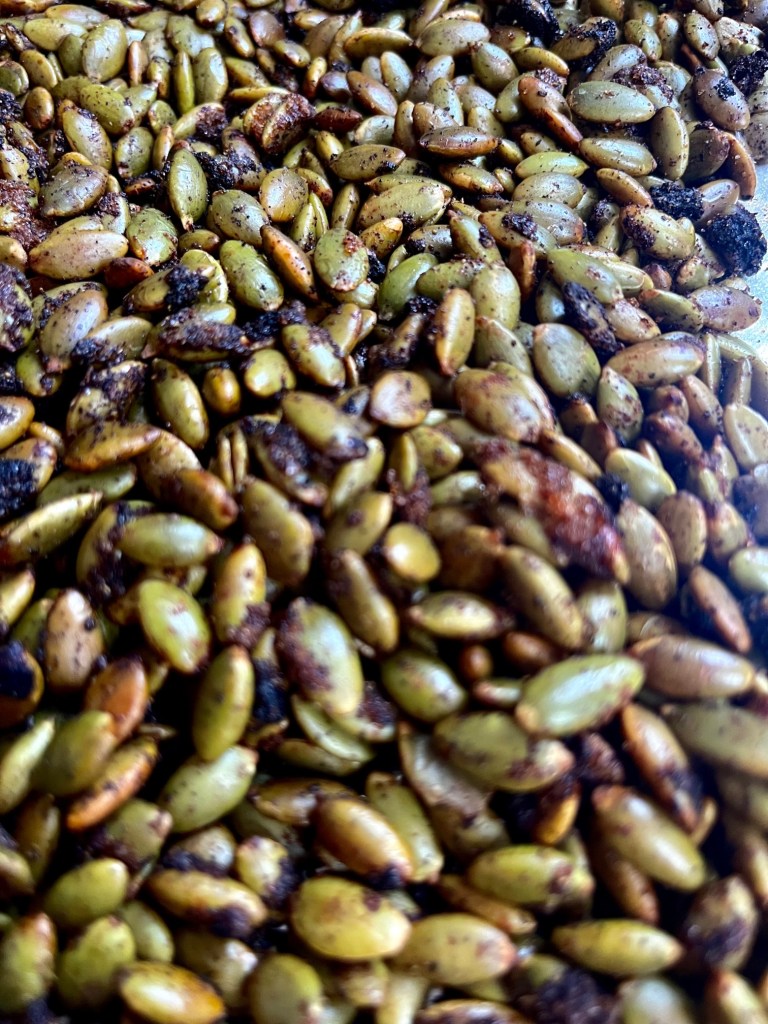 roasted pumpkin seeds. Salty, spicy, and sweet.